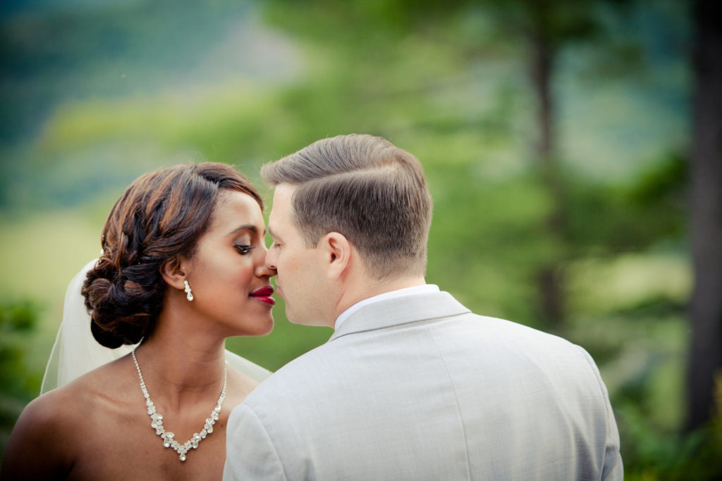 Bride and groom in an intimate kiss